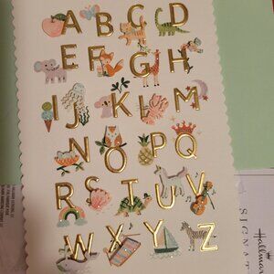 FREE premium $8 hallmark baby card with purchase of $55